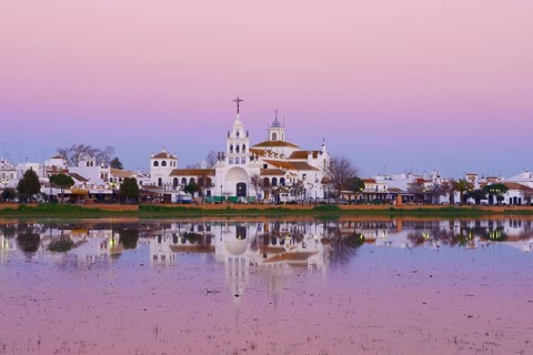 El Rocio village and hermitage at sunset