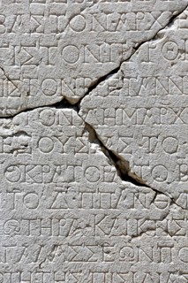 Ancient writing on marble plaque
