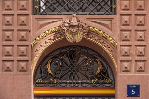 Family coat of arms of the builder on the portal