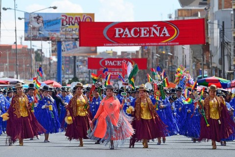 Dance group in traditional costumes at a parade