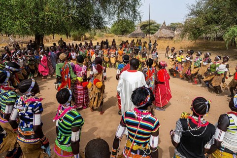 Traditional dressed young girls practising local dances