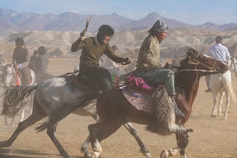 Men practising a traditional Buzkashi game