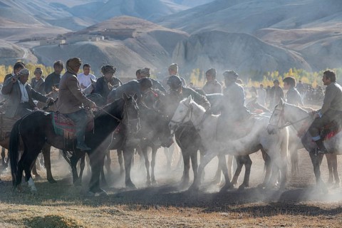 Men practising a traditional Buzkashi game