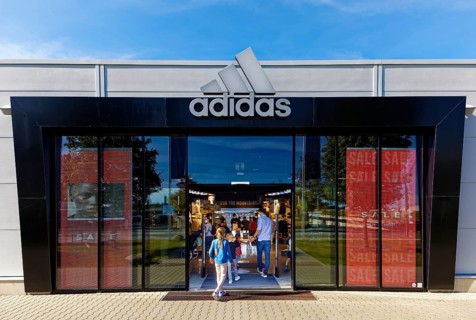 Customers enter Adidas Brand Store