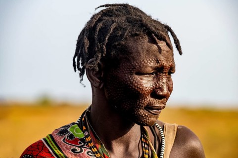 Scar face as a mark of beauty man from the Jiye tribe