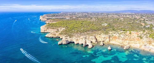 Portugal Algarve beach Praia da Marinha panorama sea ocean drone shot from above in Praia da Marinha