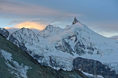 Sunset at the summit of Zinalrothorn