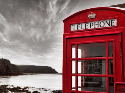 Red telephone box on the coast
