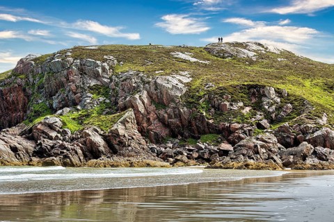 Bay with rocks and sandy beach