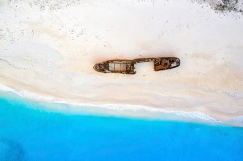 Beach shipwreck Navagio Beach drone shot bird's eye view in Zakynthos