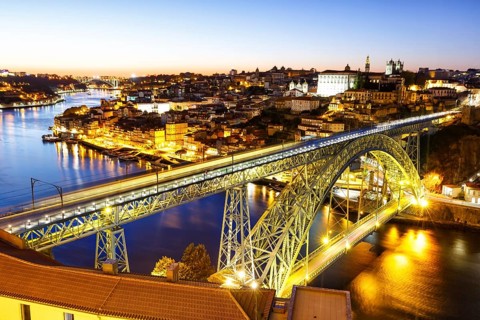 Porto with bridge Ponte Dom Luis I over river Douro night evening travel city in Porto