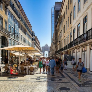 Lively pedestrian street Rua da Augusta in the old town district Baixa
