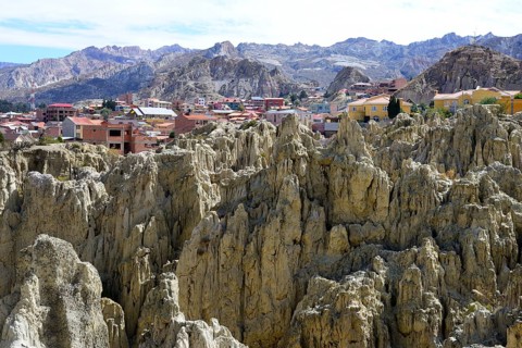 Homes behind the bizarre rock formations in the Valle de la Luna