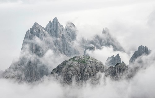 Cloudy rocky mountain peaks