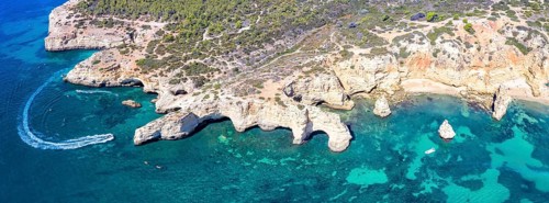 Portugal Algarve beach Praia da Marinha panorama sea ocean drone shot from above in Praia da Marinha