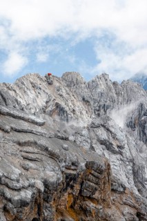 Bivouac hut on rocky mountain ridge