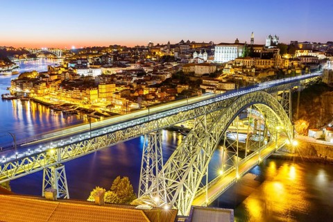 Porto with bridge Ponte Dom Luis I over river Douro night evening travel city in Porto