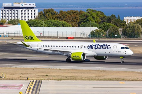 An Air Baltic Airbus A220-300 with registration number YL-AAO at Lisbon Airport