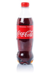 Coca Cola Coca-Cola soft drink beverage in a plastic bottle cut-out isolated against a white background