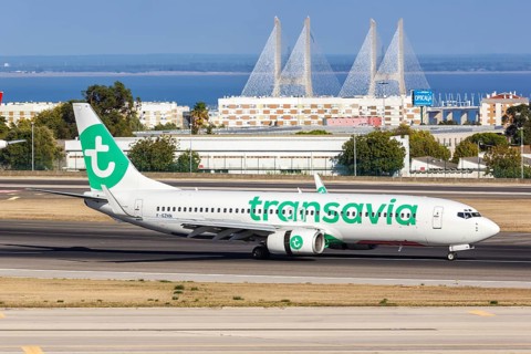 A Transavia Boeing 737-800 aircraft with registration F-GZHN at Lisbon Airport