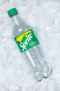 Sprite lemonade soft drink drink in a plastic bottle on ice cube ice cubes