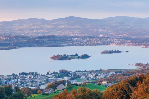 View at sunset from Feusisberg over Lake Zurich with the islands of Ufenau and Luetzelau