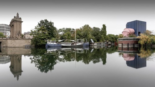 The Landwehr Canal with restaurant ship Capt'n Schillow and the UT 2 Versuchsanstalt fuer Wasserbau und Schiffbau at Charlottenburger Tor