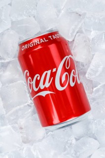 Coca Cola Coca-Cola can lemonade soft drink drink on ice cube cubes