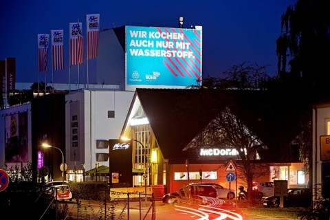 McDonald's and large poster Climate steel at the ThyssenKrupp Steel Bochum plant