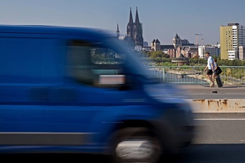 Traffic on the Zoobruecke with cathedral in the background