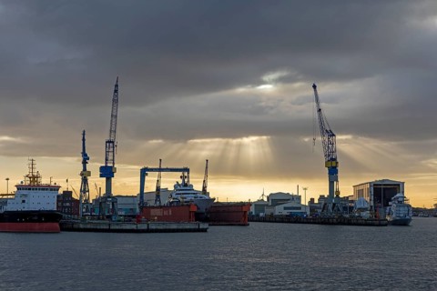 Blohm + Voss shipyard in the morning backlight