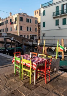 Outdoor restaurant table by Canal Vena