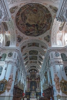 Baroque church room with altar and choir stalls