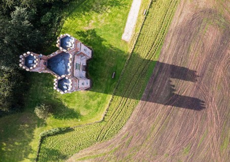 The Belvedere Tower over Powderham Park from a drone