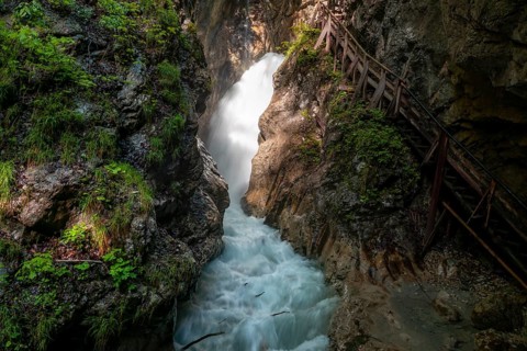 Mountain stream with waterfall