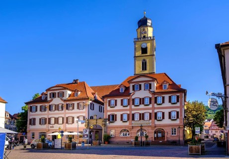Market square with twin houses and St. John the Baptist Minster