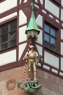 Figure of St. George as dragon slayer on Pilatus House