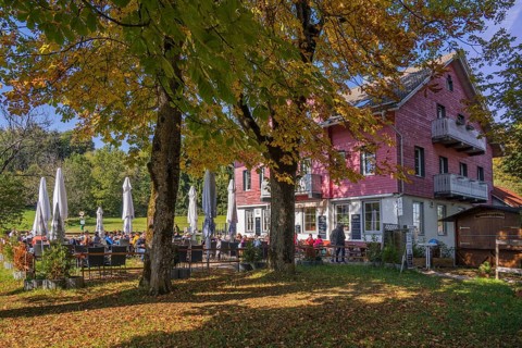 Restaurant and beer garden at Mariaberg with autumnal chestnut trees