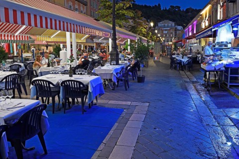 Evening hustle and bustle with restaurants and market stalls on the Cours Saleya