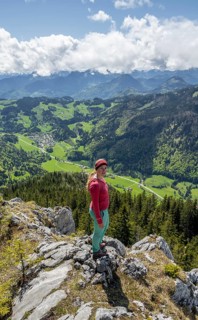 Hiker looking over the Chiemgau valley