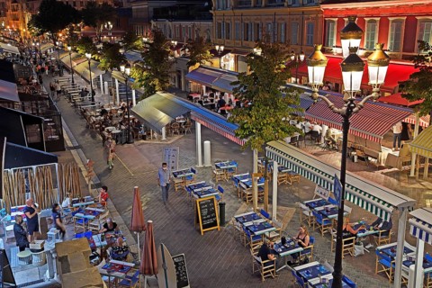 Evening hustle and bustle with restaurants and market stalls on the Cours Saleya