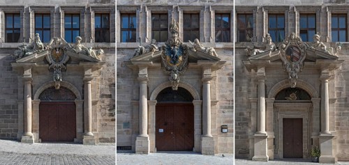 Three portals with coats of arms