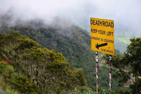 Left-hand traffic sign on the road of death
