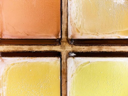 Amazing colors of sea salt ponds called salines shortly before salt extraction in Portugal