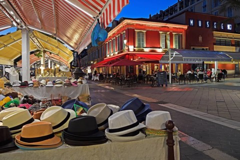 Evening hustle and bustle with restaurants and market stalls on the Cours Saleya
