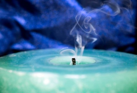 Still smoking candle wick