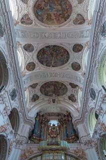 Baroque ceiling vault with organ loft of the collegiate basilica