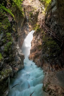 Mountain stream with waterfall