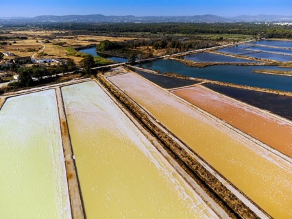 Amazing colors of sea salt ponds called salines shortly before salt extraction in Portugal