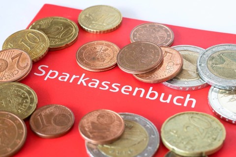 Savings bank book with small change